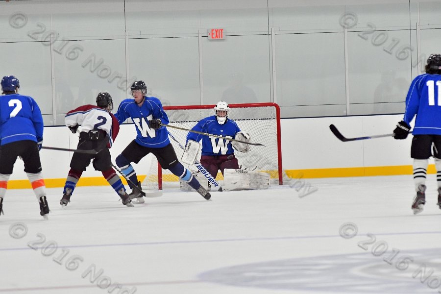 Wheaton College Men\'s Ice Hockey vs Middlesex Community College. - Photo By: KEITH NORDSTROM